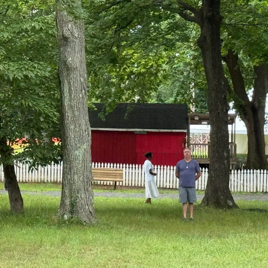Shaded lawn and grounds outside the retreat venue in East Brunswick, New Jersey